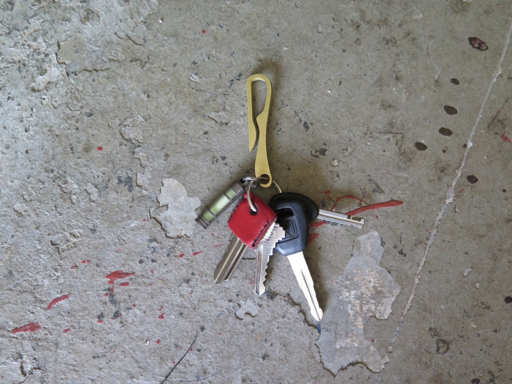 H.L. Human Pelican Clip - Brass
