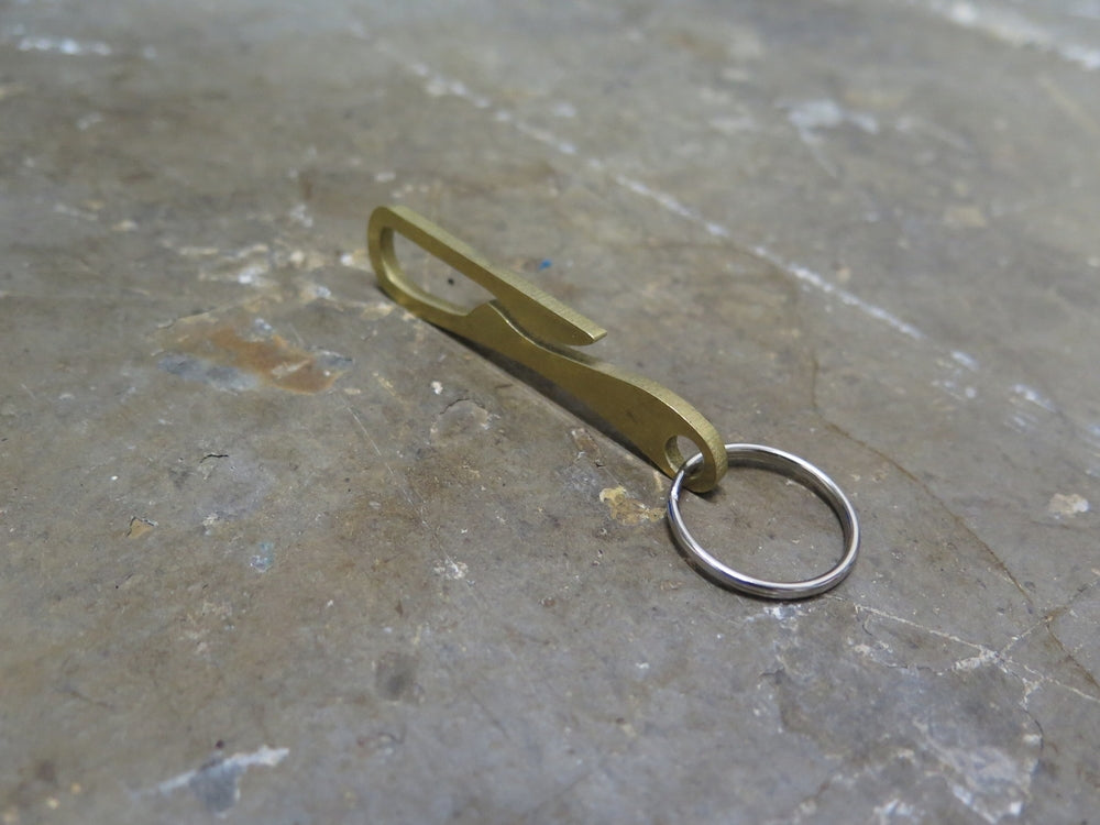 H.L. Human Pelican Clip - Brass