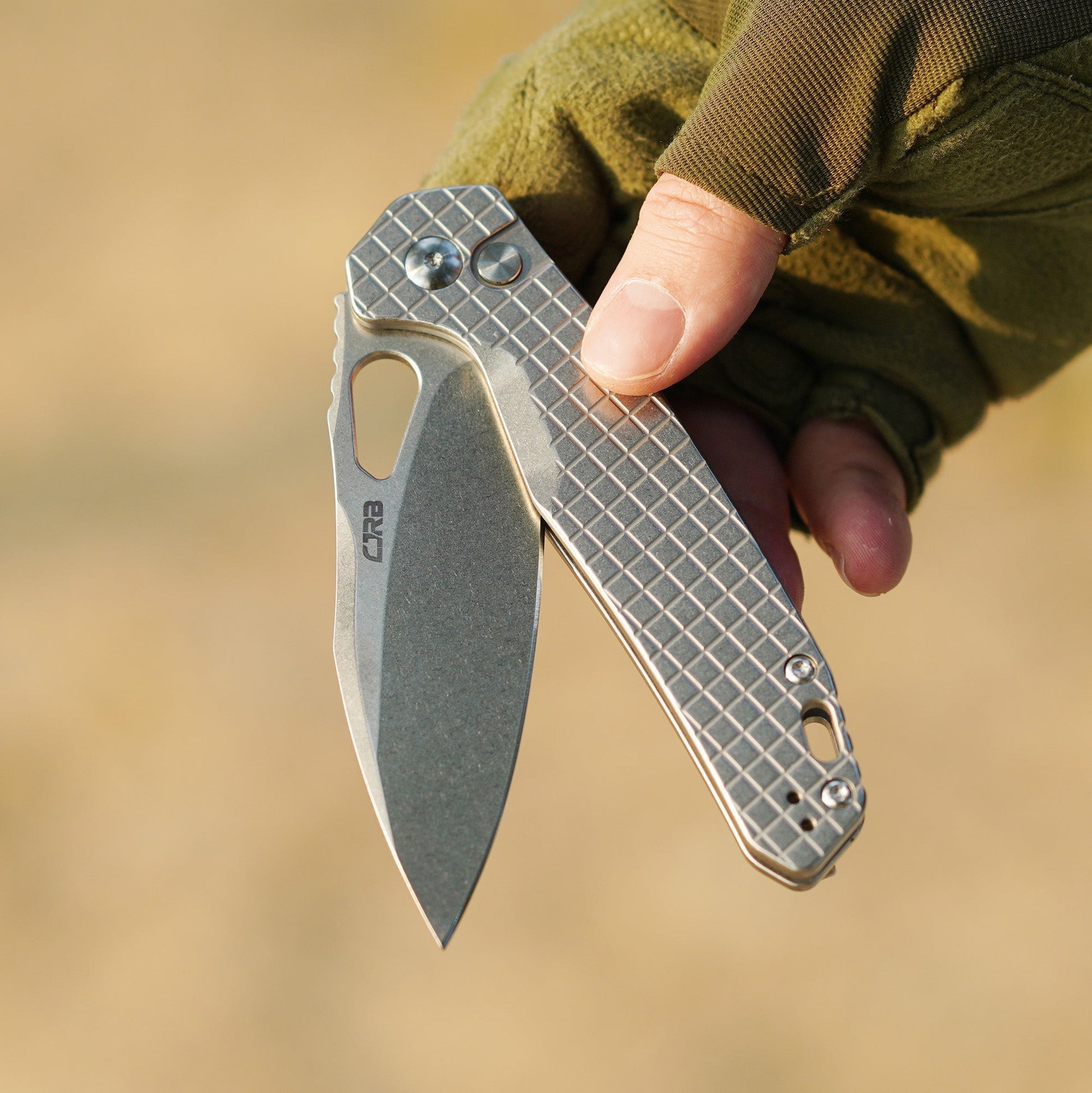 CJRB Frack J1931FST frag pattern stainless steel handle scales and button lock