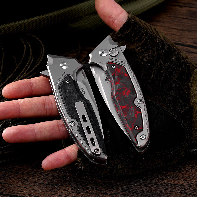 Klaken B05 Hermod J214-RedCarbonTi red carbon fiber handle shown alongside carbon fiber colorway
