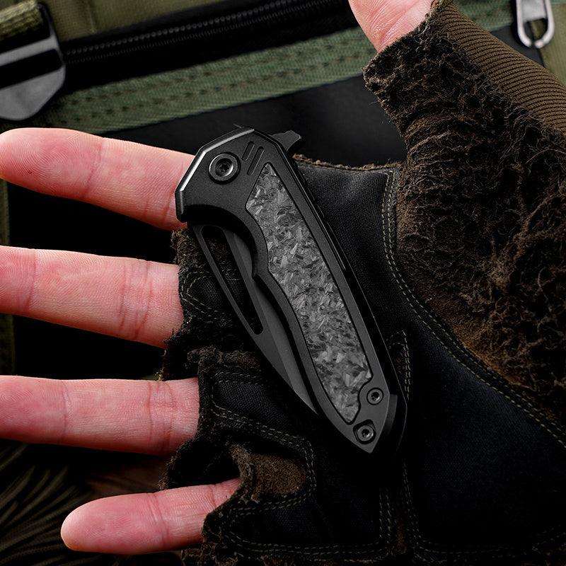 Klaken B08 Ragna J236 crushed carbon fiber inlay titanium handle detail