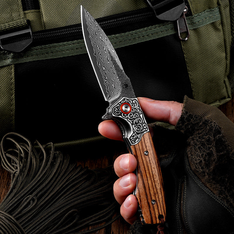 Klaken J358 Ardent J358-Zebrawood blade detail - Damascus pattern