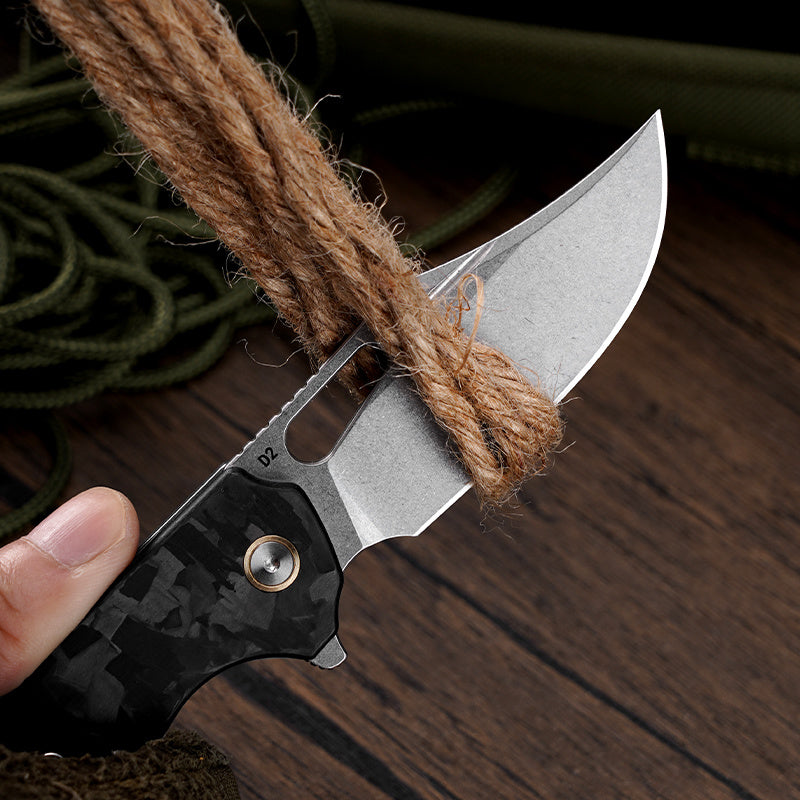 Klaken Vapor J388-BlackShreddedCarbon blade detail – satin D2 drop point edge
