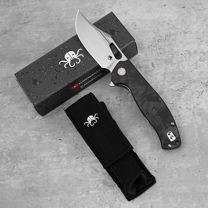 Klaken Vapor J388-BlackShreddedCarbon open position showing satin D2 drop point blade