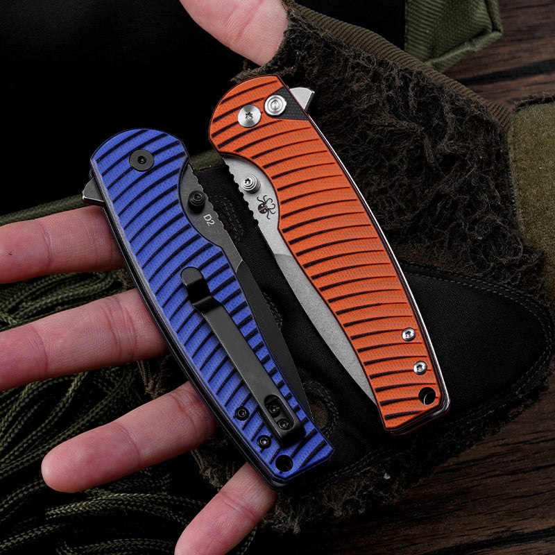 Klaken J392 Riftline J392-OrangeG10-SatinBlade open position showing satin D2 drop point blade and orange G10 handle