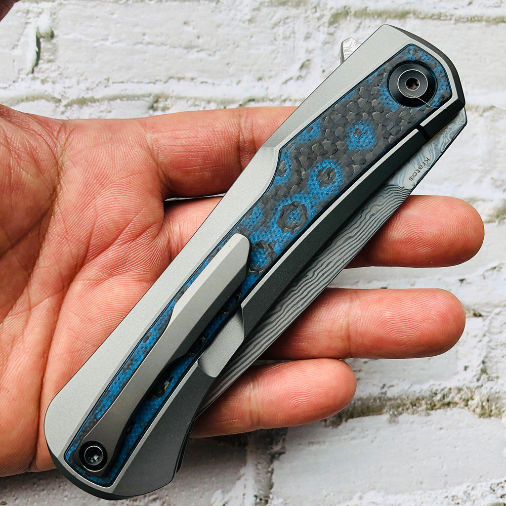 Kansept Kratos K1024A4 titanium handle with blue rose pattern carbon fiber inlay