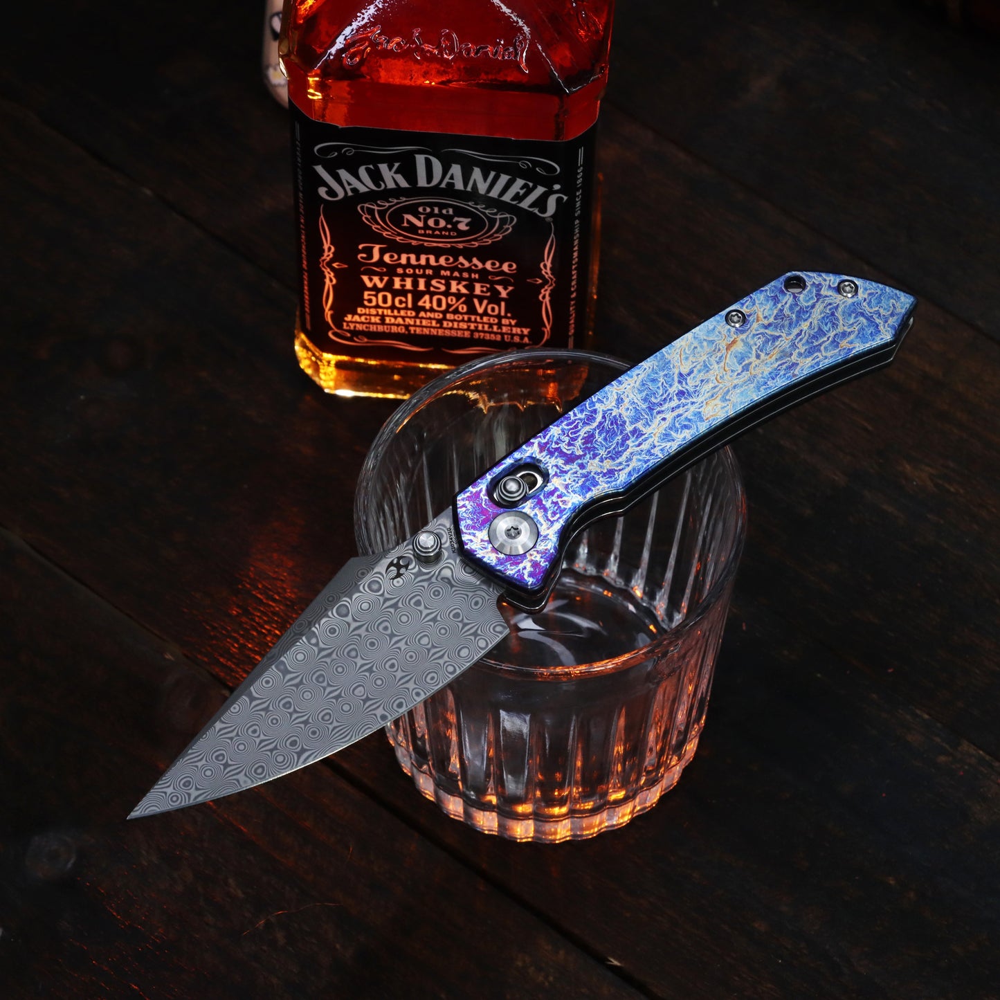 Kansept Fenrir K1034V10 front view – 3.48" acid etched Damascus harpoon crossbar lock folding knife
