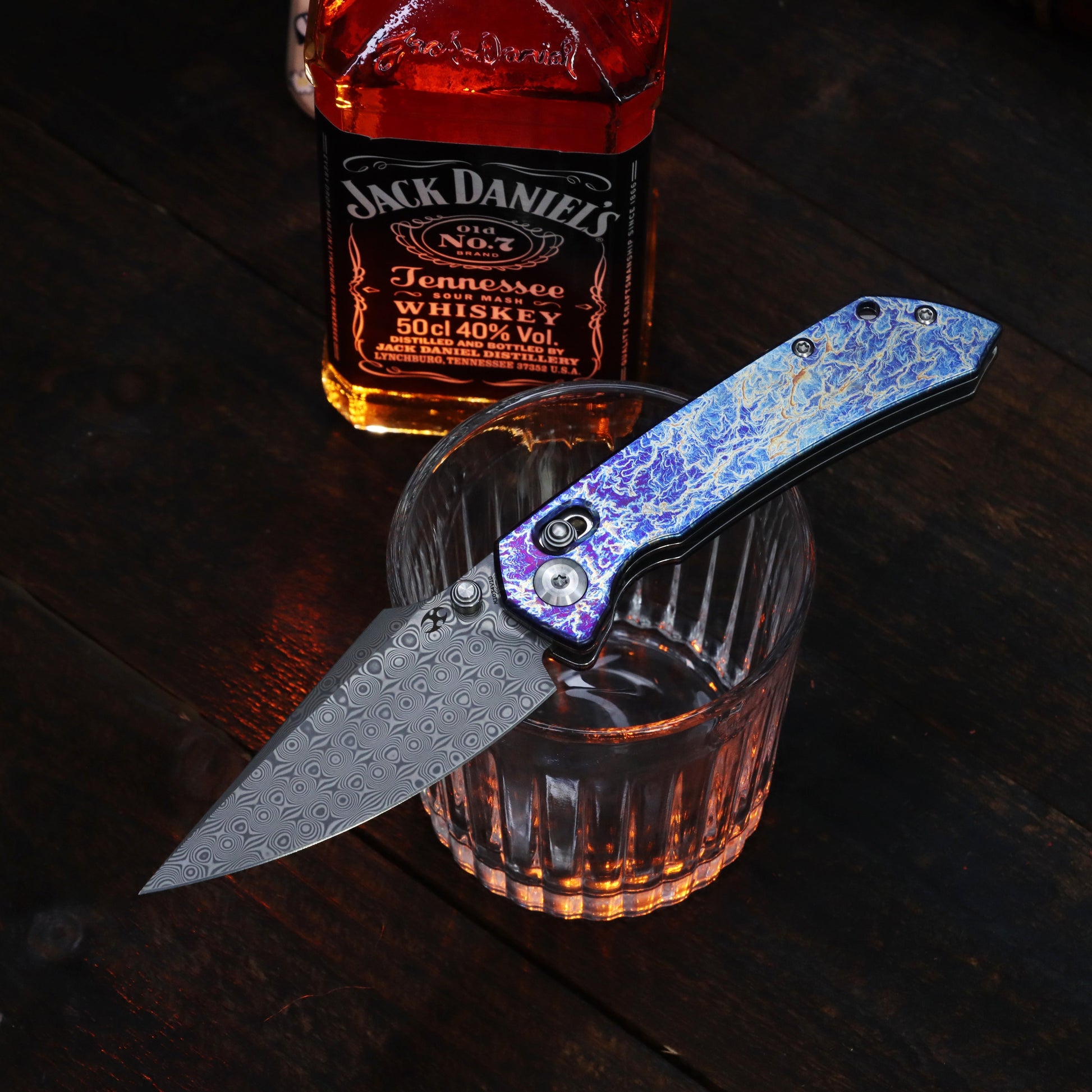 Kansept Fenrir K1034V10 front view – 3.48" acid etched Damascus harpoon crossbar lock folding knife