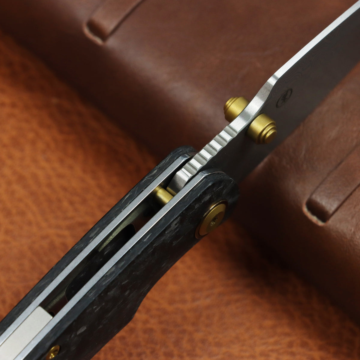 Kansept Falk K1142A1 blade detail – Acid Etched Damascus Drop Point