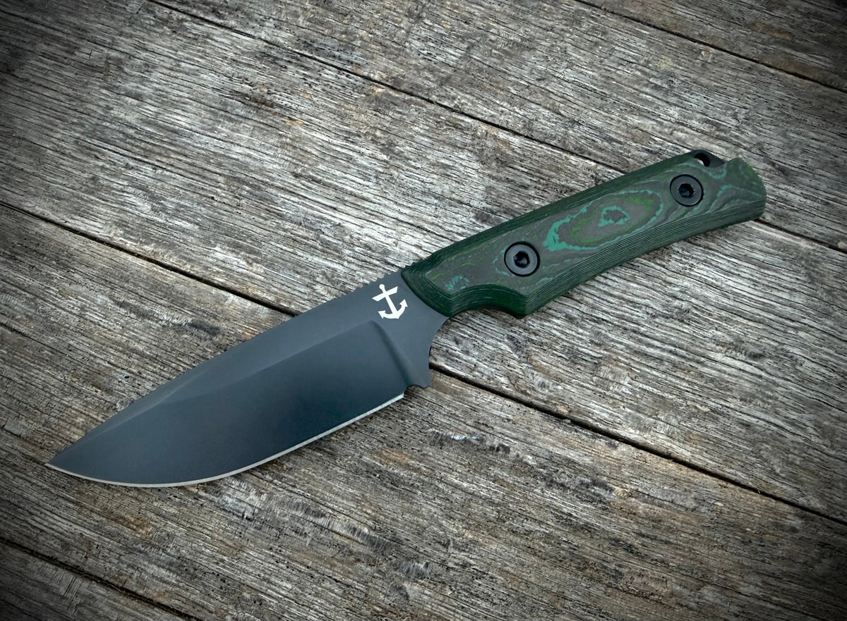 Leucadia Blade Co LandShark Kelp Bed CamoCarbon Black DLC front view – 3.5" black DLC MagnaCut drop point fixed blade, Kelp Bed CamoCarbon handle