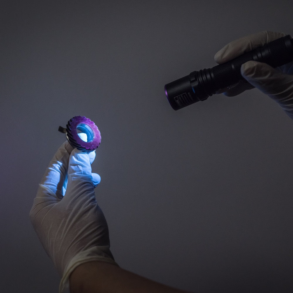 Weltool M2-BF 365nm UV flashlight revealing fluorescence