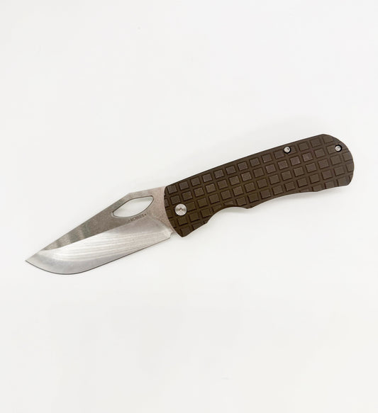 McNees Knives Dixon 3.75 inch MagnaCut frame lock knife with bronze handle