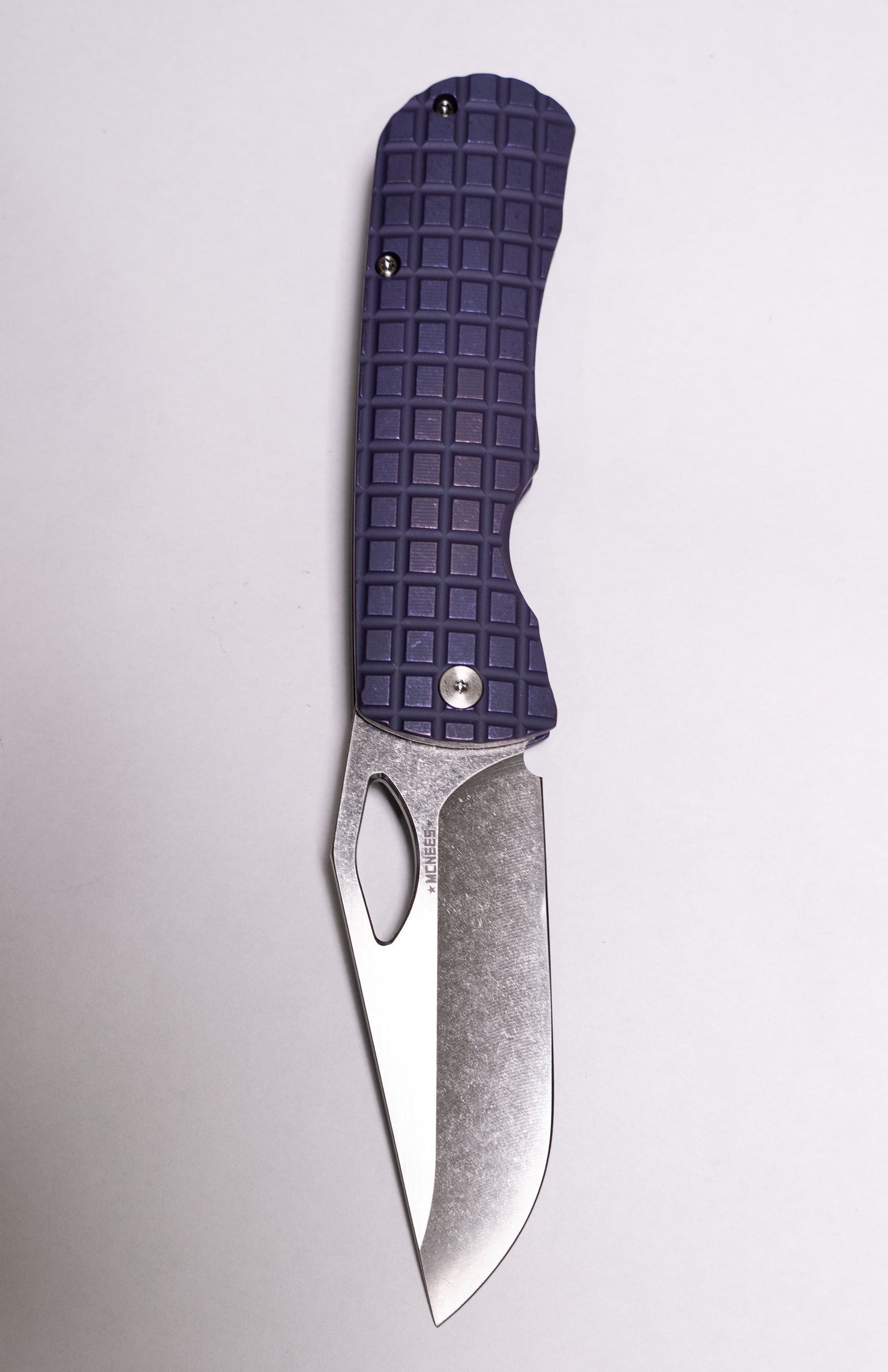 Purple textured handle with silver blade
