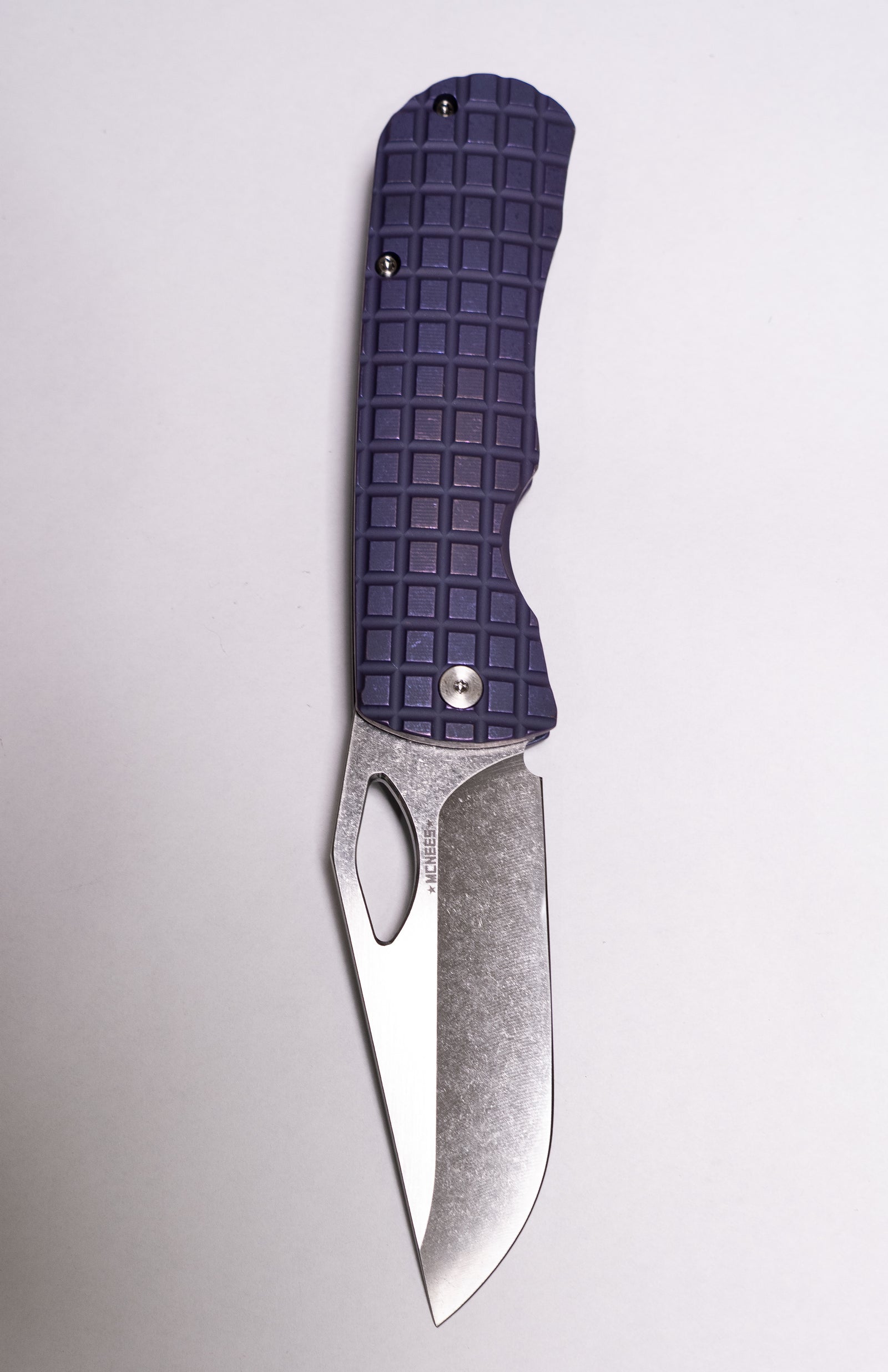 Purple textured handle with silver blade