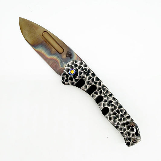 Medford Praetorian Slim open, showing the 3.25″ S45VN Vulcan drop point blade and Black Peaks & Valleys sculpted titanium handle