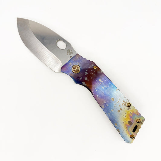 Medford TFF-1 open, showing the 4″ tumbled S35VN drop point blade and brushed titanium Galaxy flamed handle