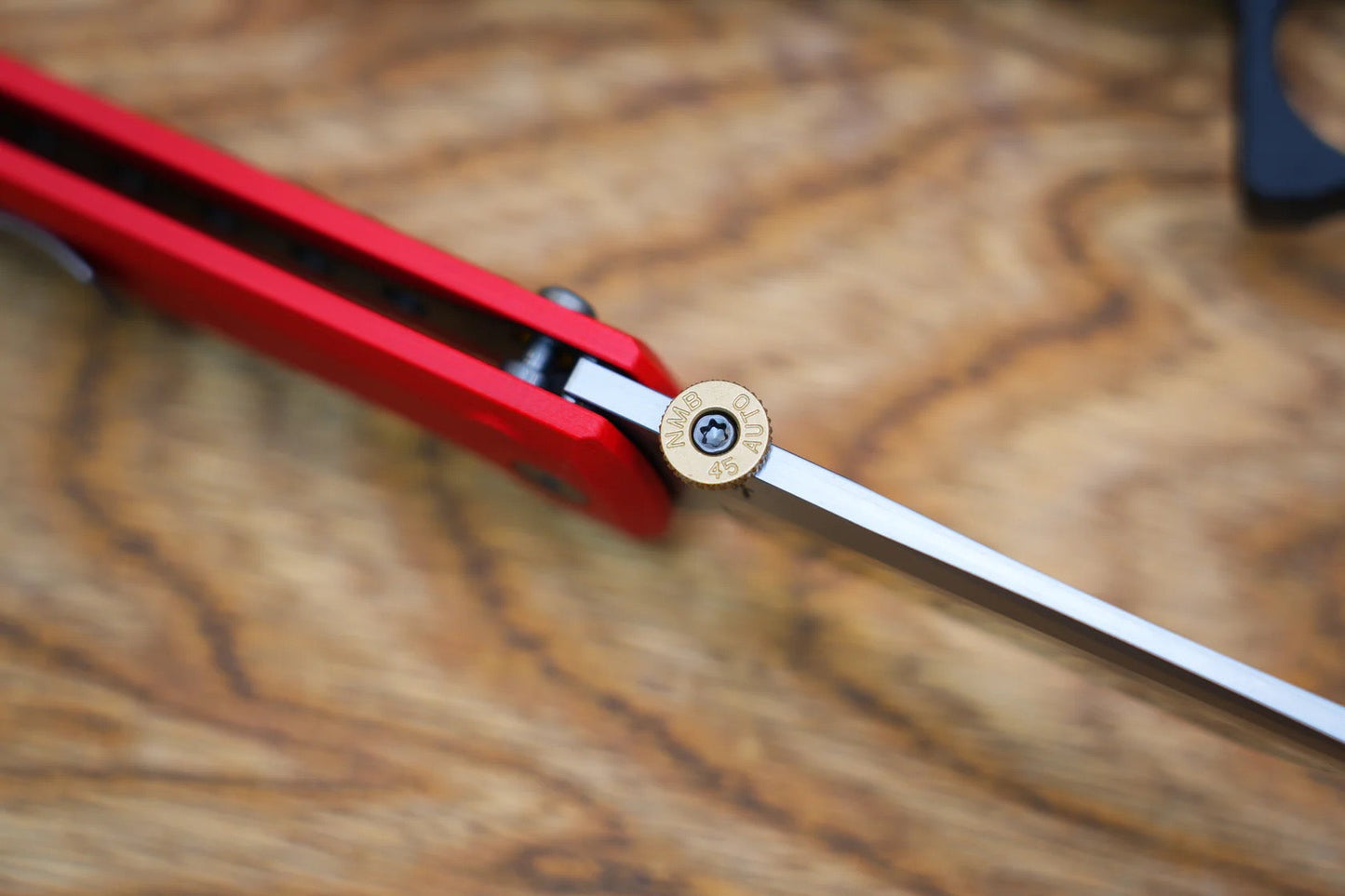 North Mountain Blade Chop 2 – Red G10 Handle, 3.5" SLD-Magic Blade, Button Lock, Flipper & .45 ACP Thumb Disk