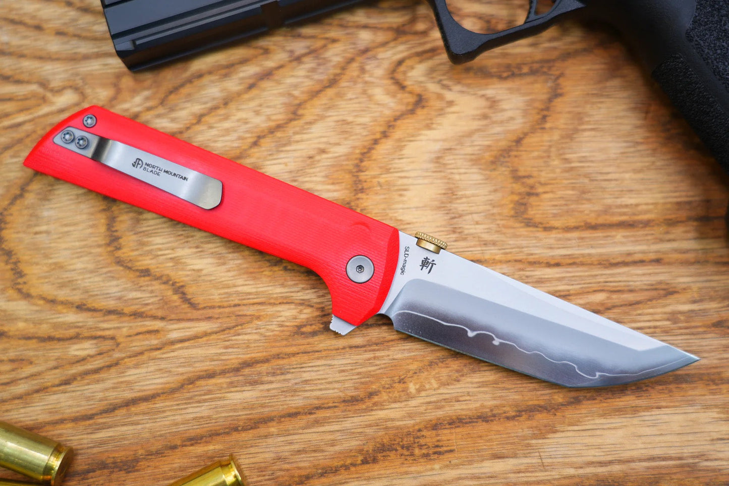 North Mountain Blade Chop 2 – Red G10 Handle, 3.5" SLD-Magic Blade, Button Lock, Flipper & .45 ACP Thumb Disk