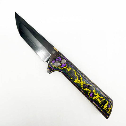 North Mountain Blade 2406 Venom Chop2 – 3.5" SLD-Magic DLC Tanto Folding Knife UV Reactive Carbon Fiber Handle .45 Style Thumb Disc