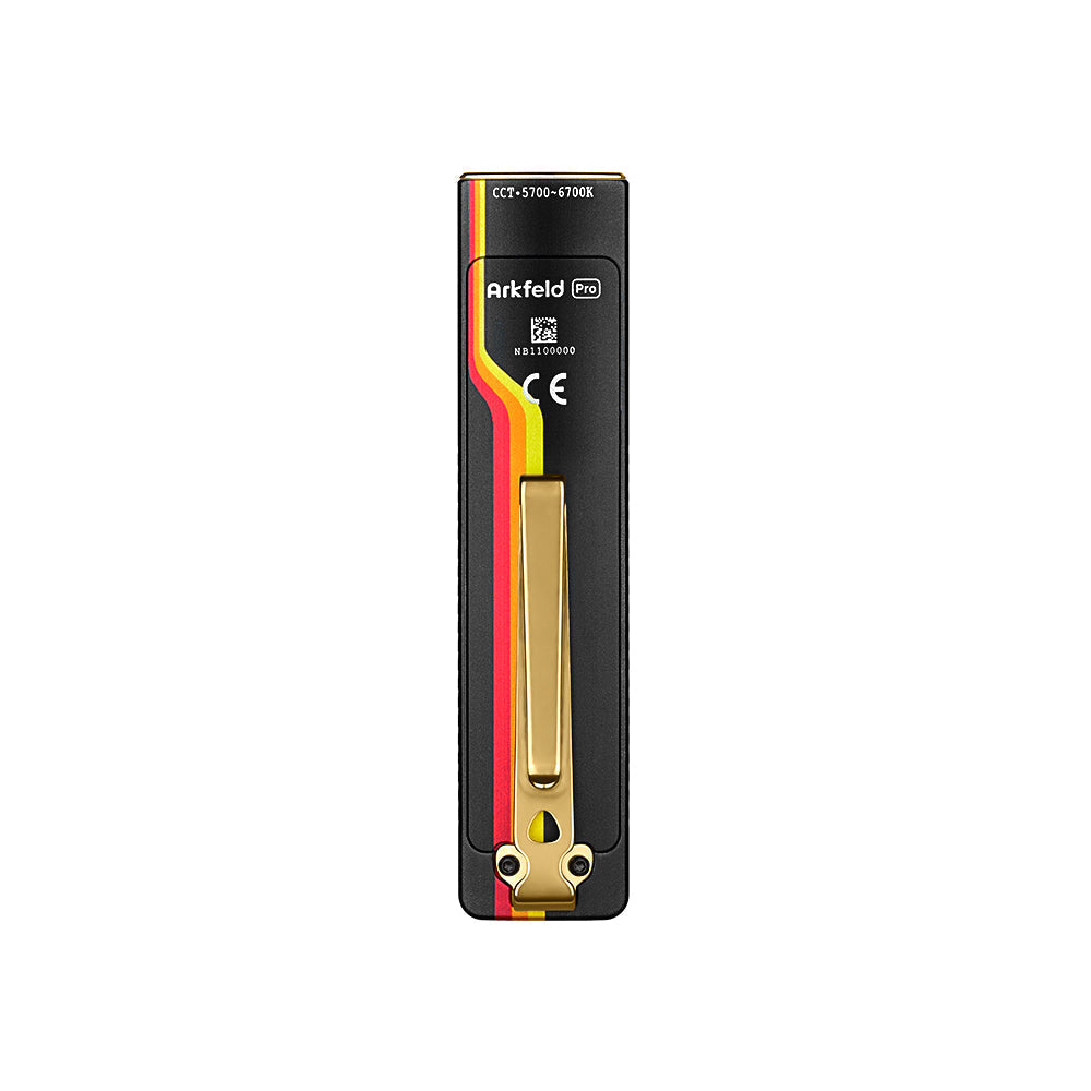 Olight Arkfeld Pro Racing Stripes rear view showing the magnetic charging contacts and pocket clip