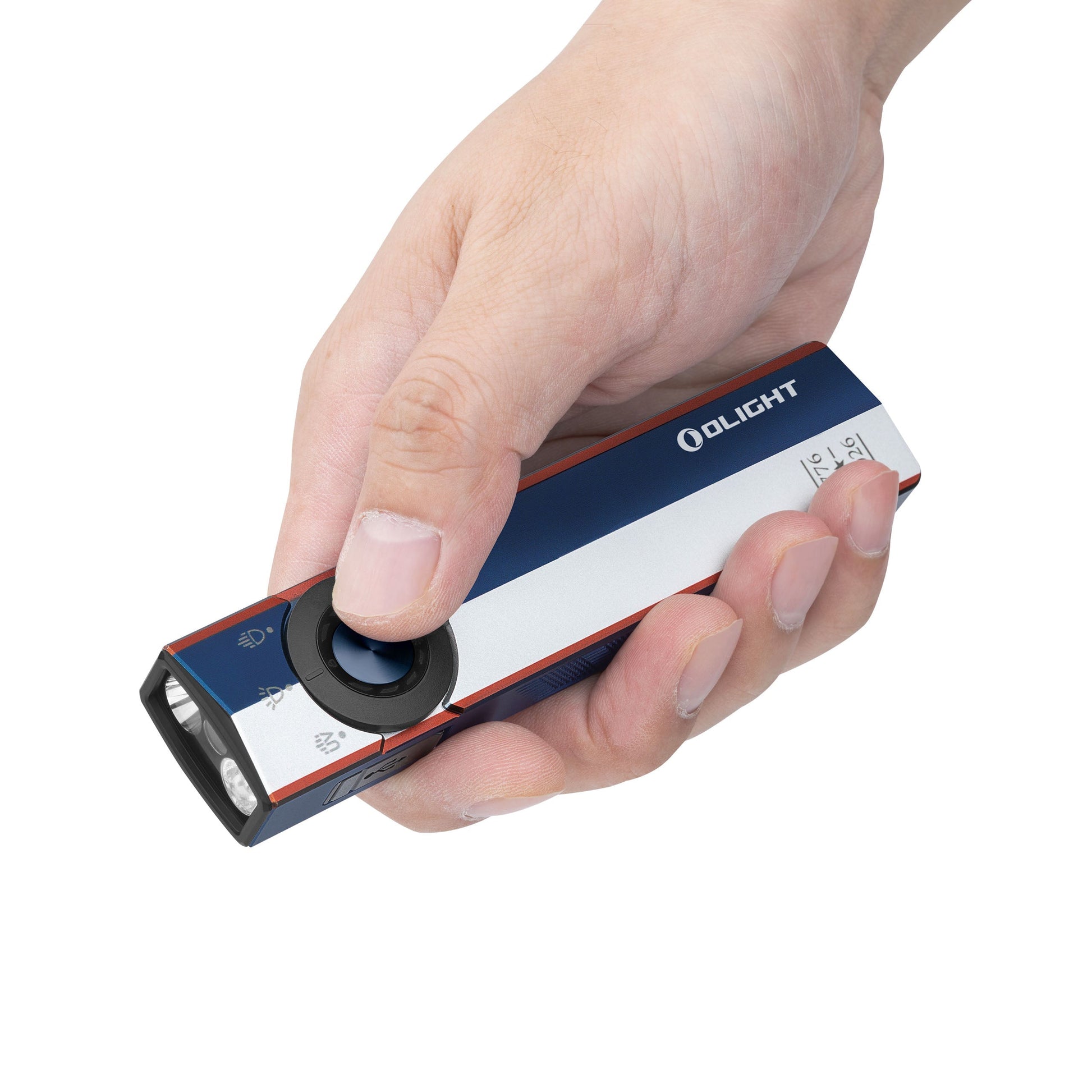 Olight ArkPro Liberty Lines held in hand showing its flat EDC profile and thumb-reach selector