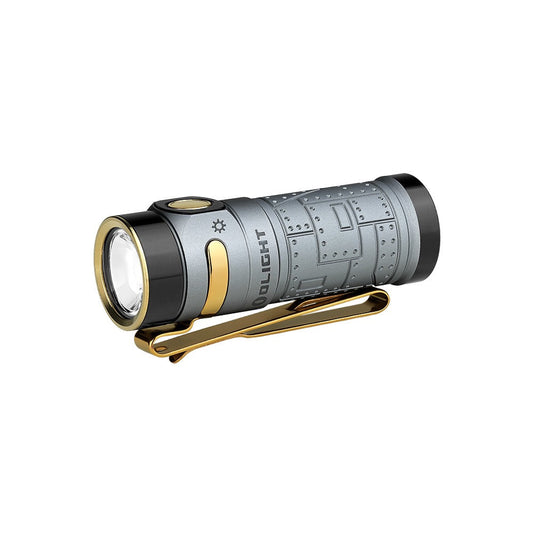 Olight Baton 4 Fighter Pilot angled view showing TIR lens, gold pocket clip and engraved body