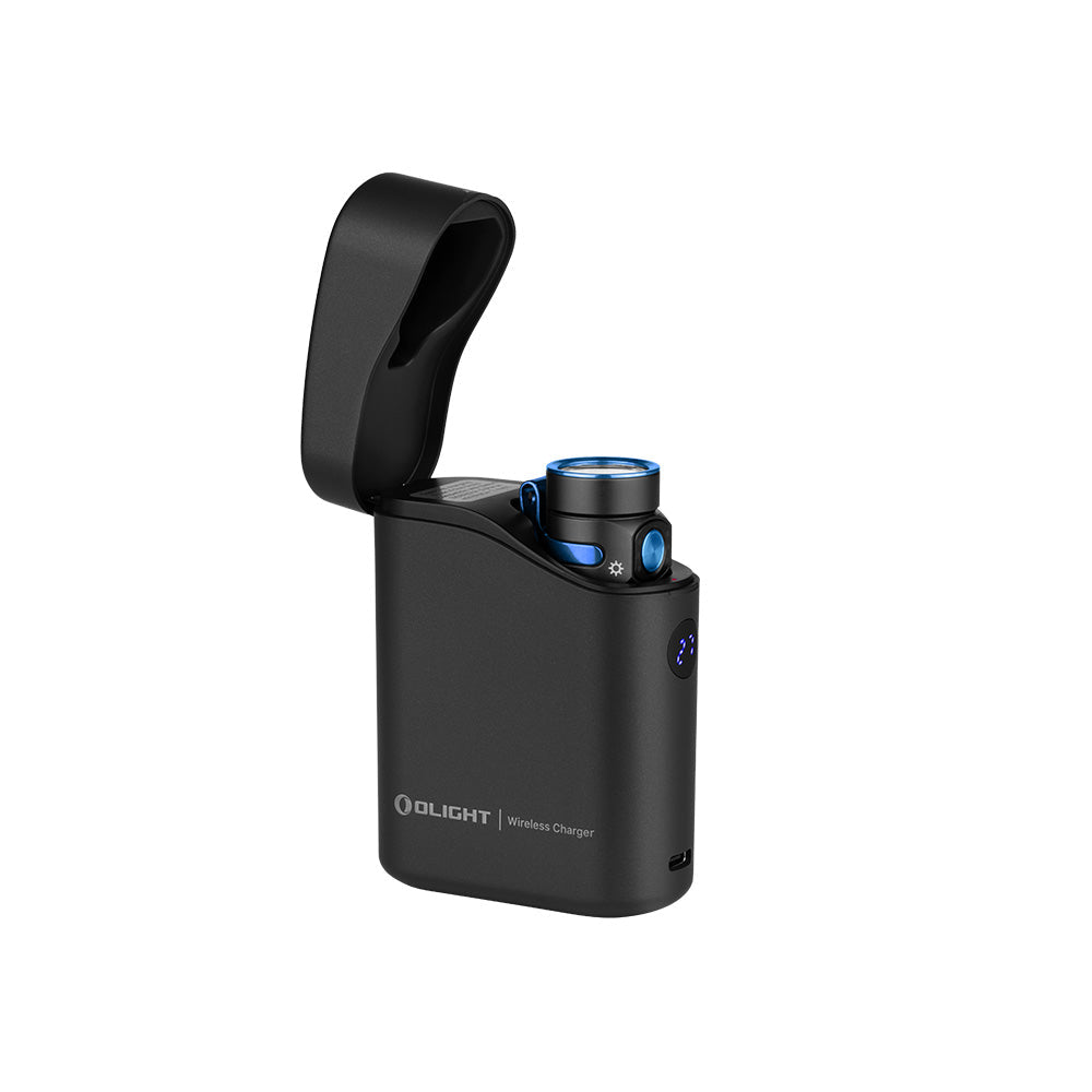 Olight Baton 4 Premium Black flashlight seated in its open wireless charging case with digital display
