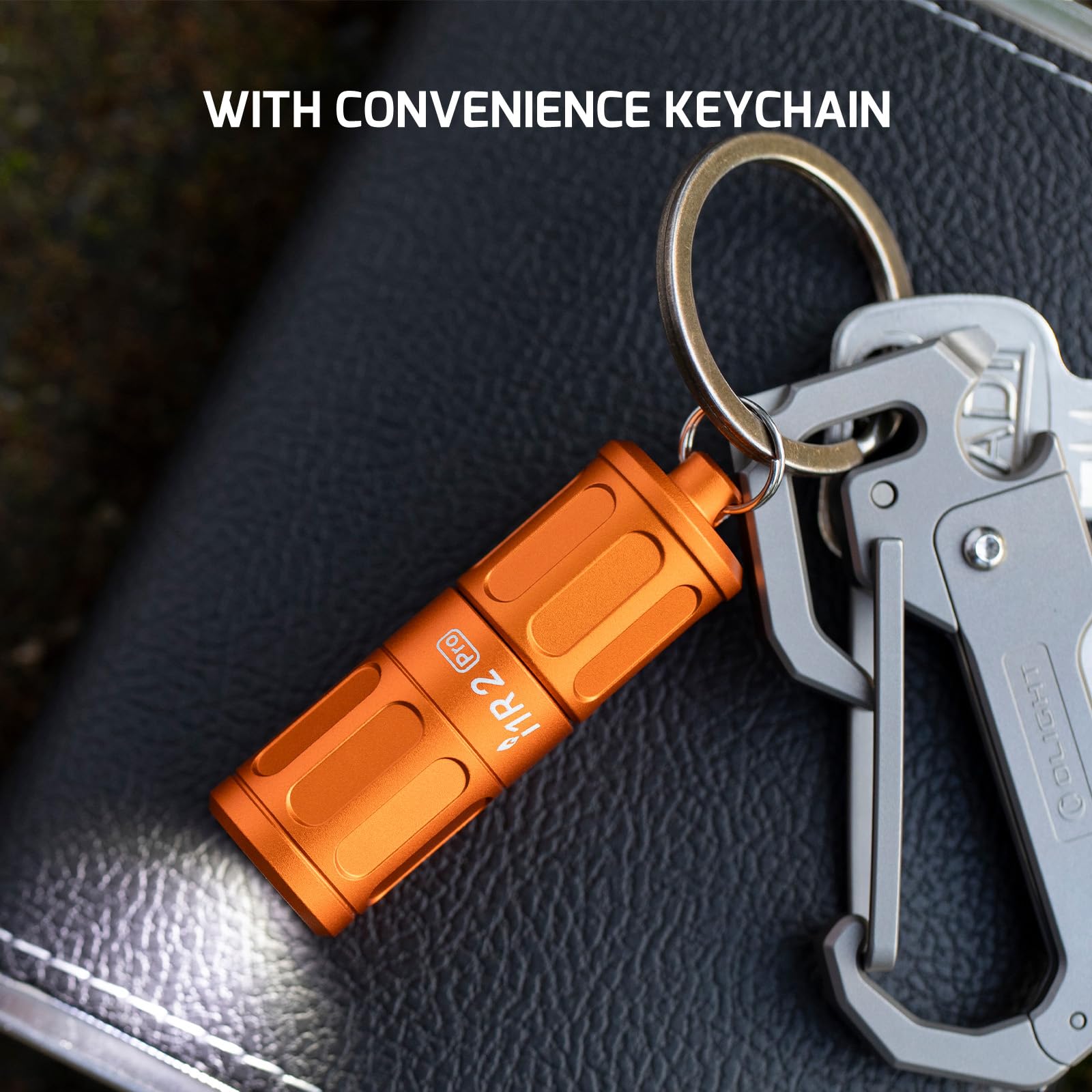 Olight i1R 2 Pro Capsule Orange with convenience keychain and carabiner