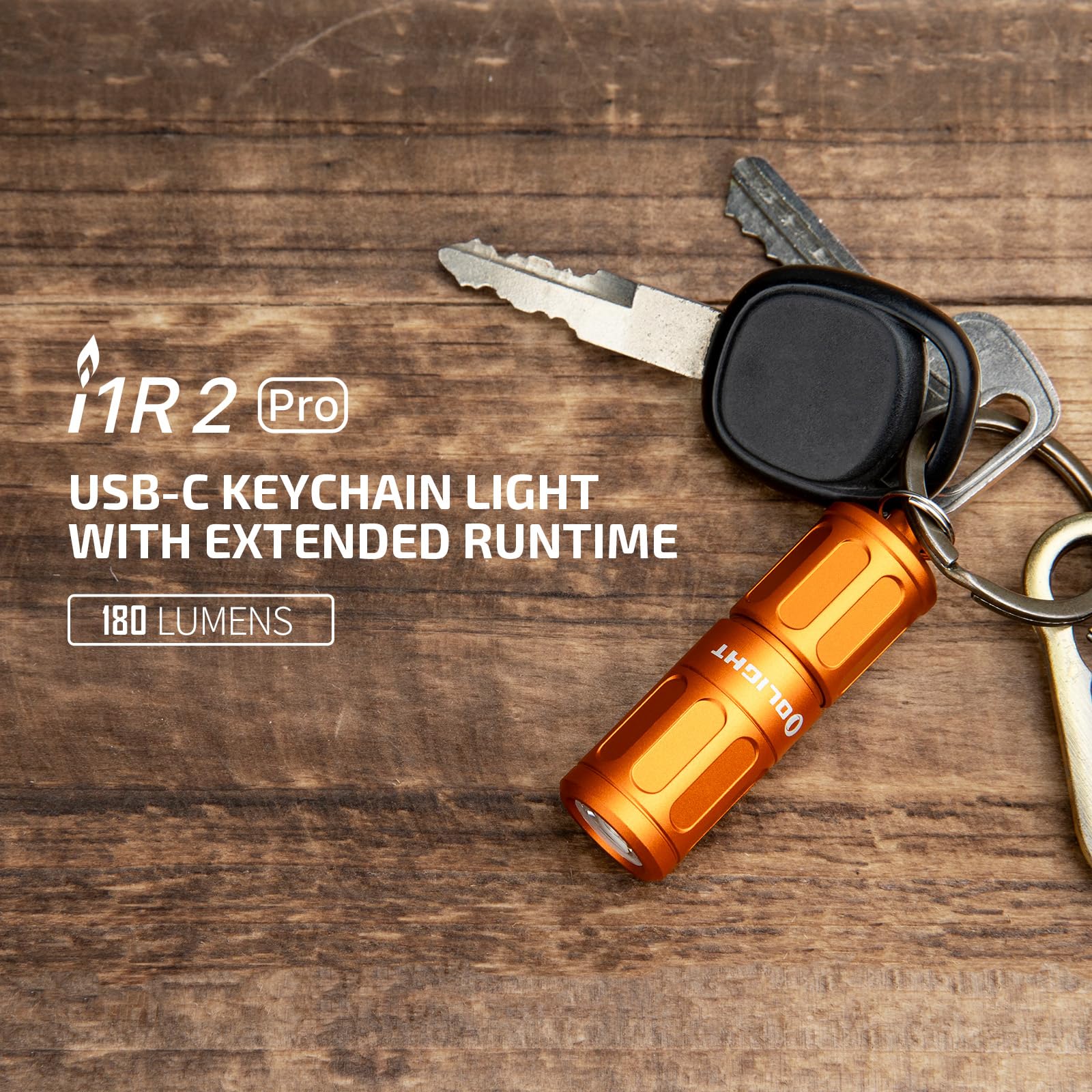Olight i1R 2 Pro Capsule Orange USB-C keychain light shown attached to keys