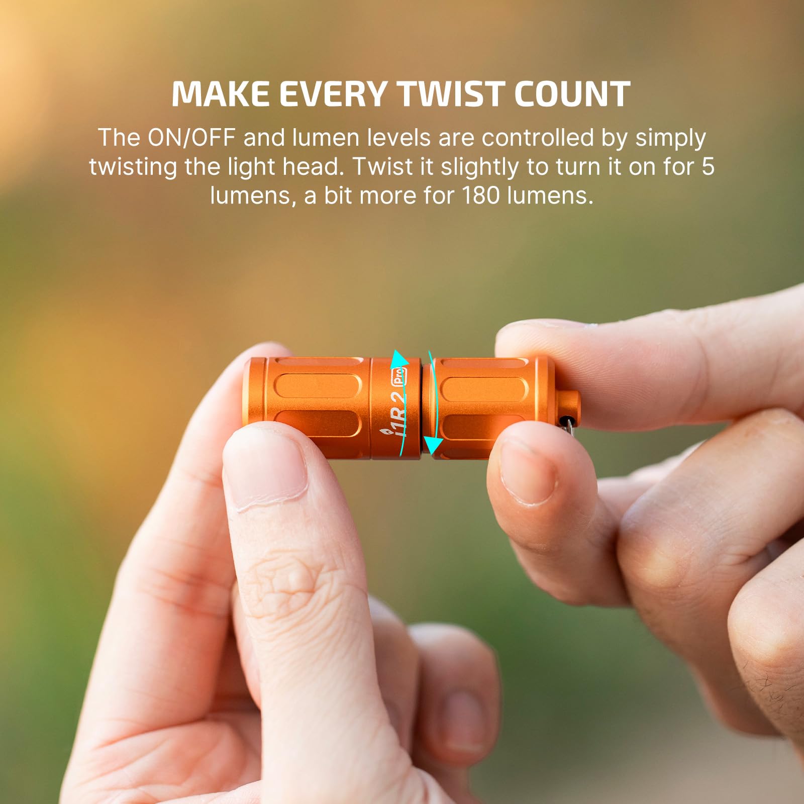 Olight i1R 2 Pro Capsule Orange twist activation shown in hand