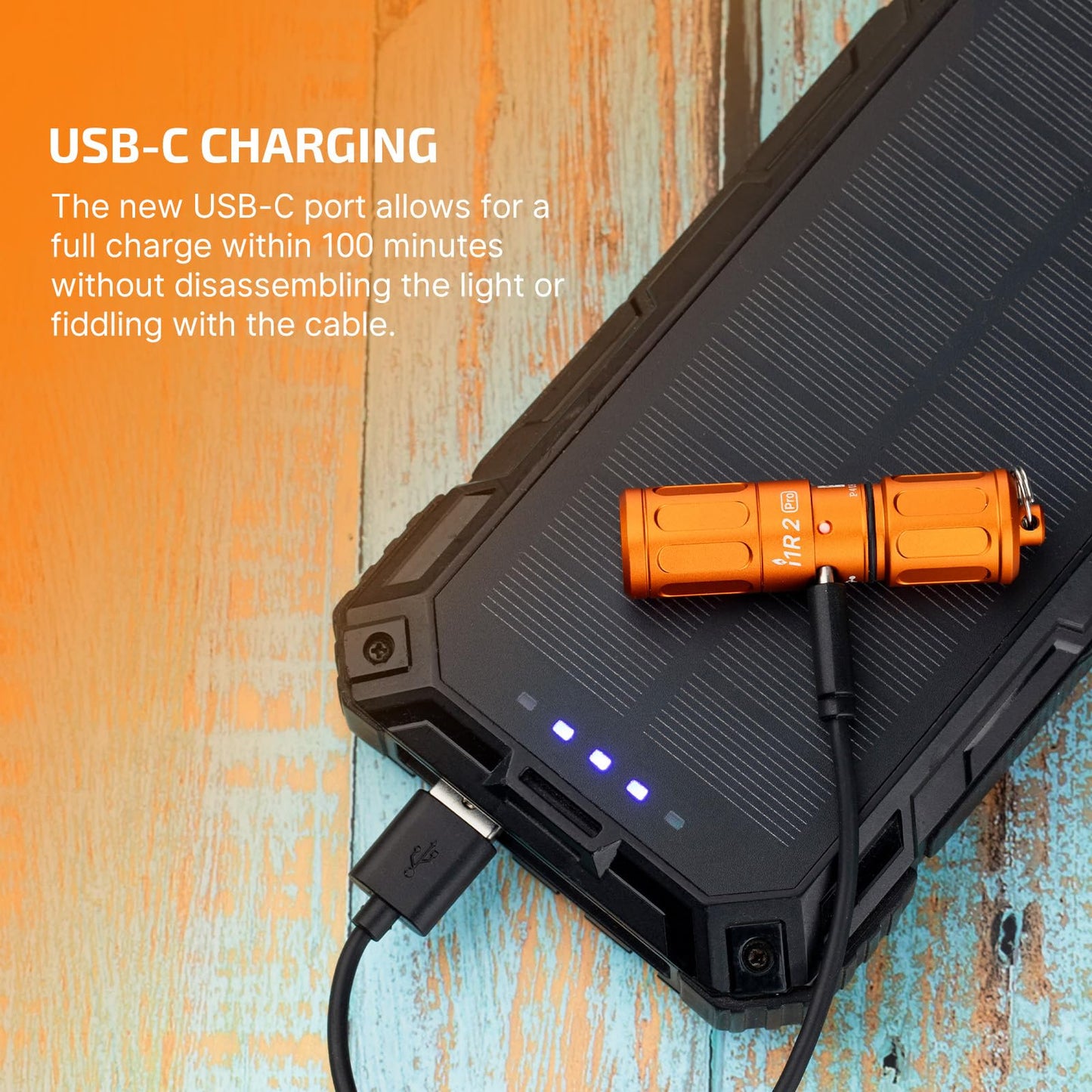 Olight i1R 2 Pro Capsule Orange charging via USB-C