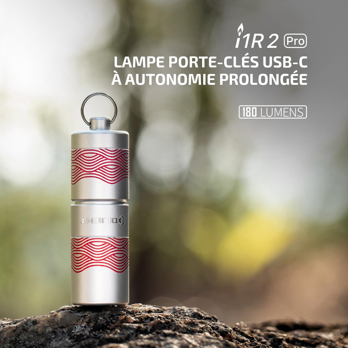 Olight i1R 2 Pro Flow USB-C keychain light with extended runtime, shown outdoors
