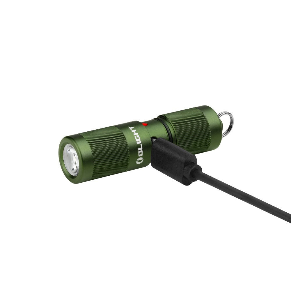 Olight i1R 2 Pro Green connected to a USB-C charging cable