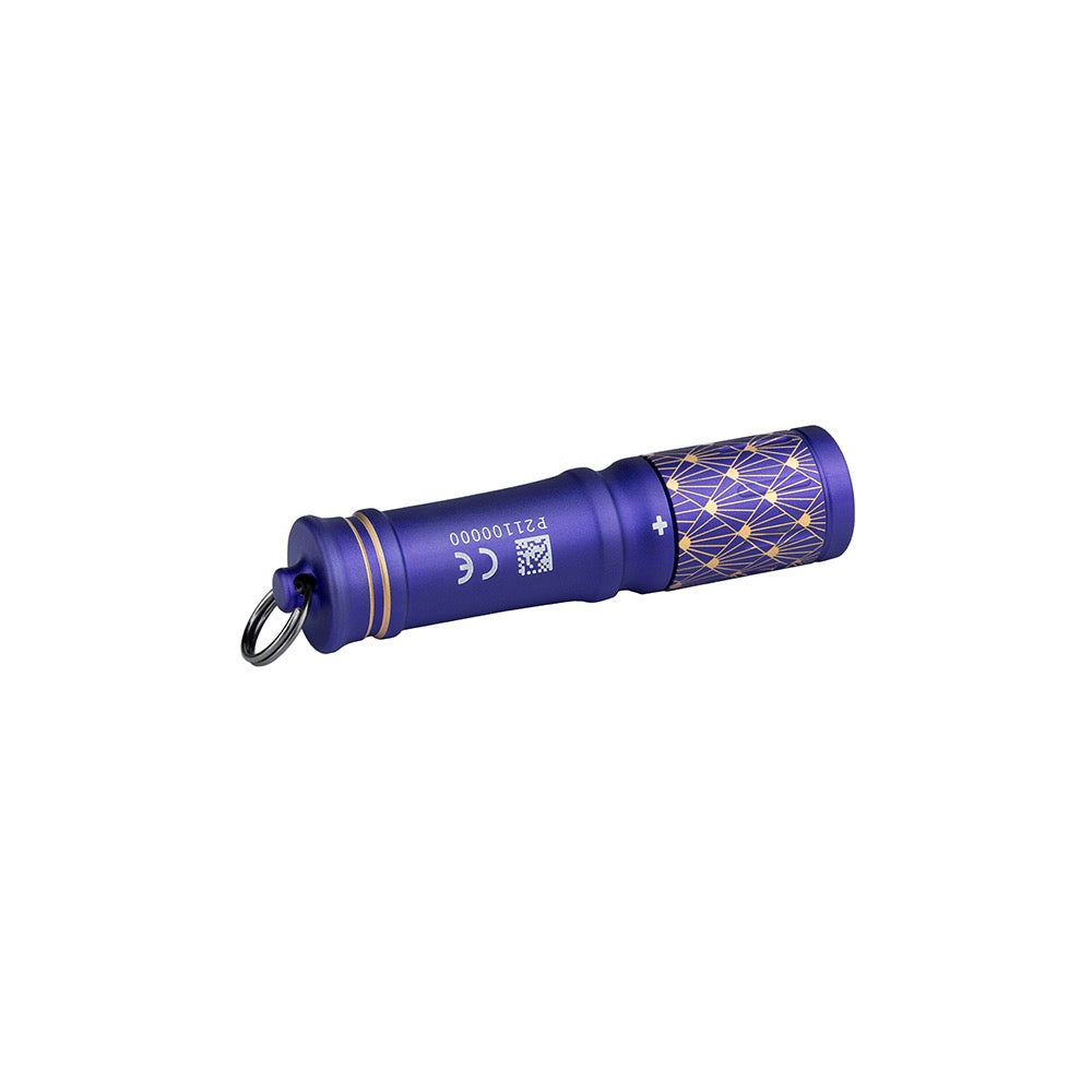 Olight i3E EOS 18th Anniversary Edition side view showing the engraved anniversary pattern