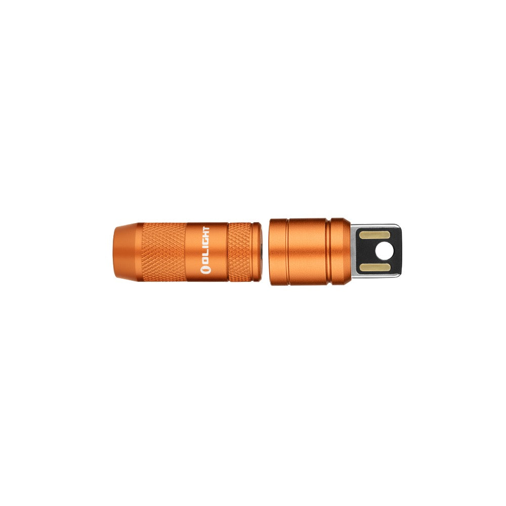 Olight imini 2 Orange with its integrated USB plug extended for charging
