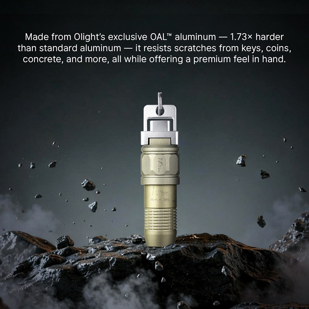 Olight iUltra Olive Green shown outdoors demonstrating its rugged durability