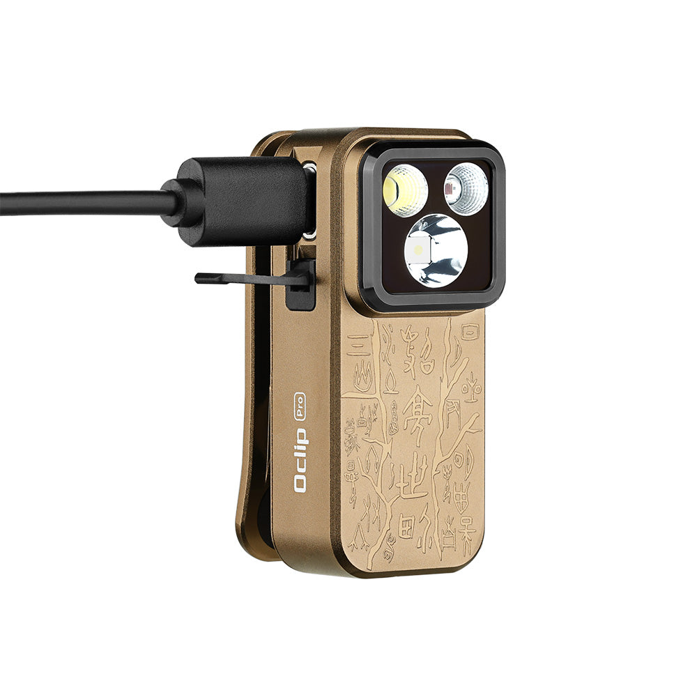 Olight Oclip Pro Ancient Script charging via USB-C cable under the rugged port cover