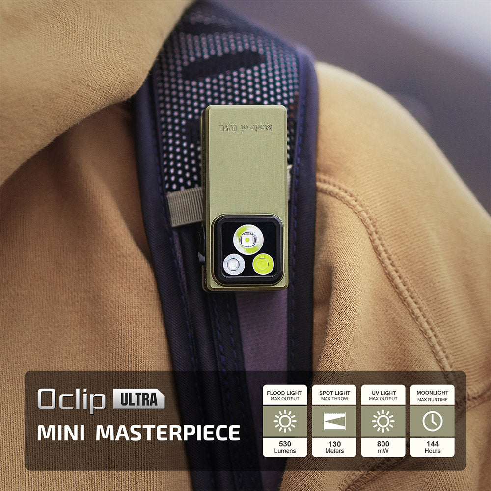 Olight Oclip Ultra Olive Green clipped to a backpack strap – mini masterpiece with white light, spotlight, UV light and runtime icons