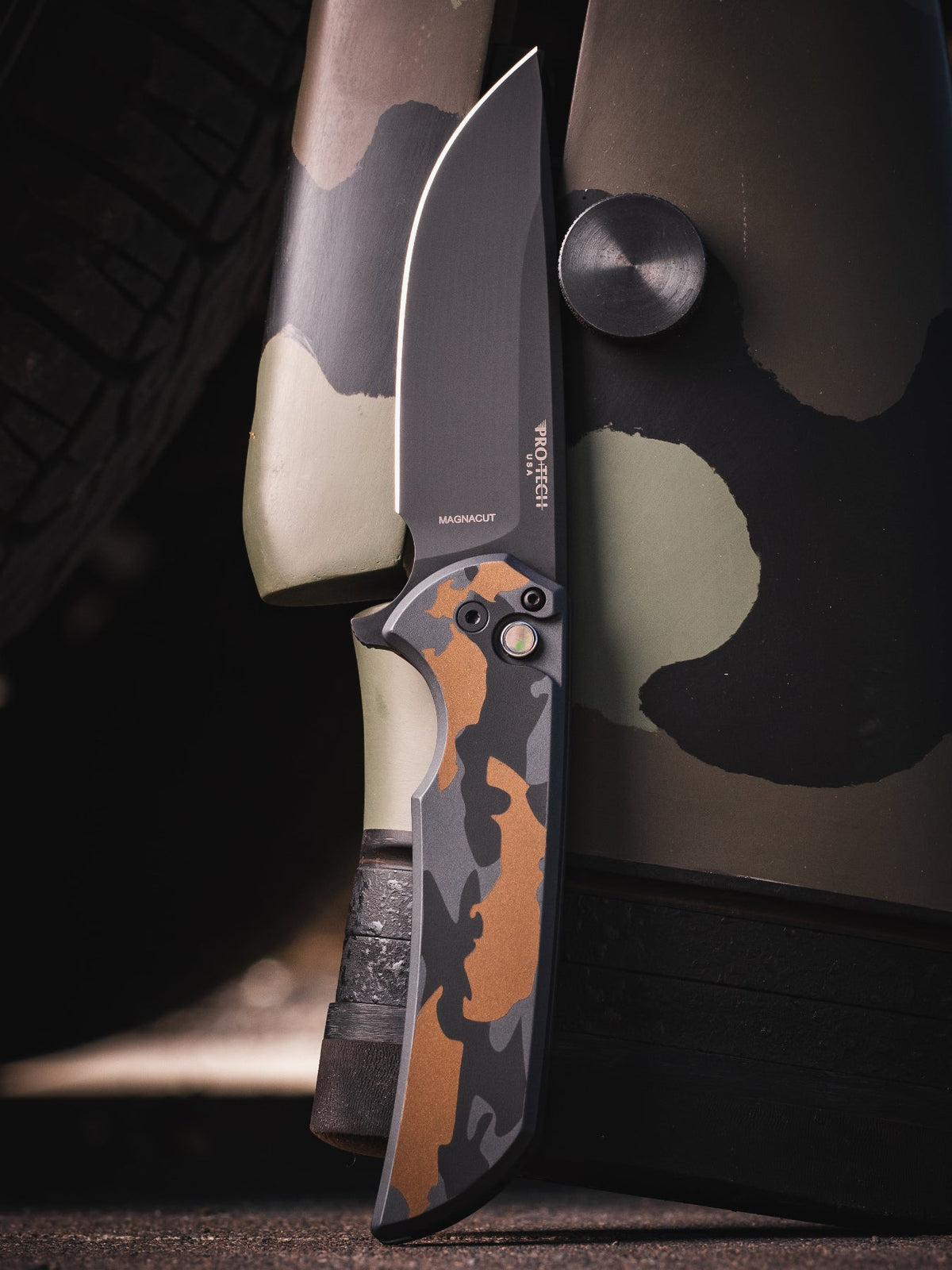 Pro-Tech Mordax CCKSF26.Mordax.2 front view – 3.5" DLC black MagnaCut drop point button lock flipper, Deluxe Camo Cerakote handle