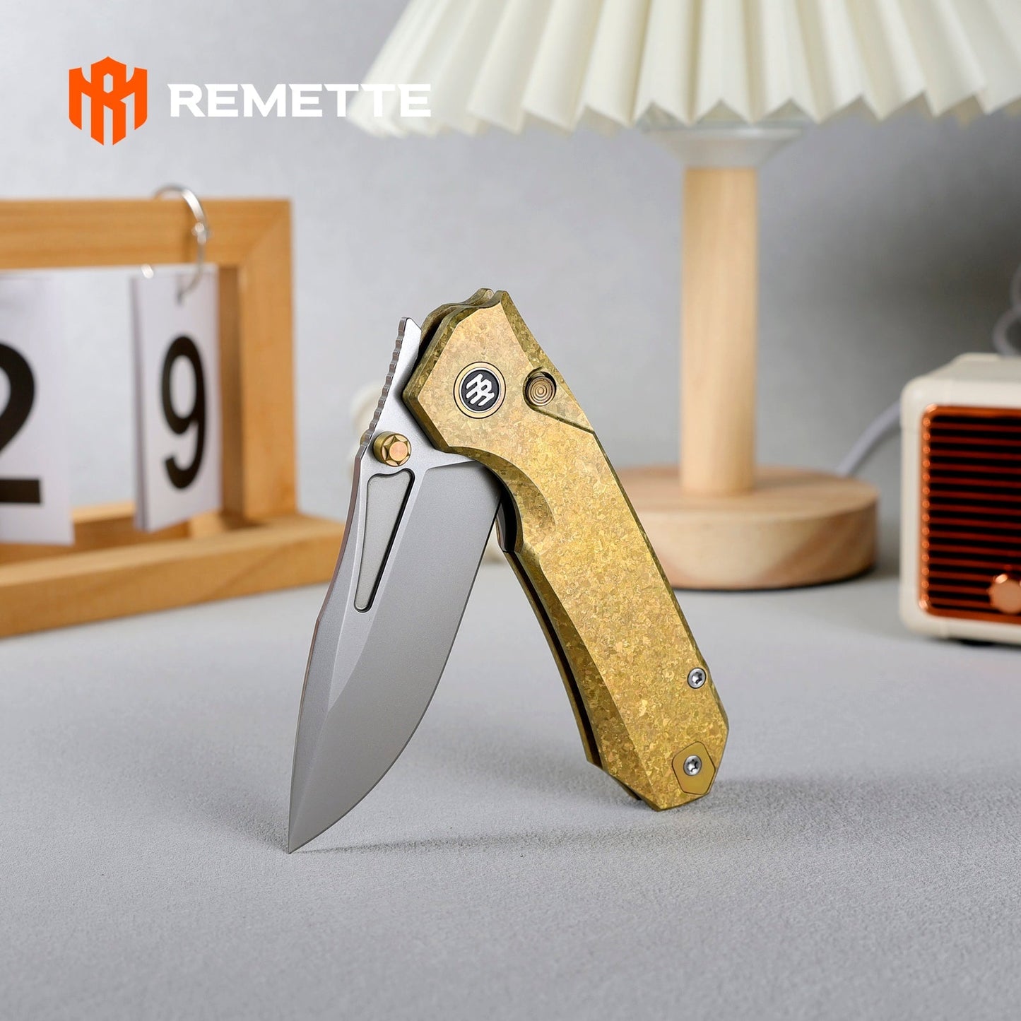 REMETTE Rhino RNTB2 – 3.07" M390 Drop Point Button + Liner Lock Knife Crystallized Titanium