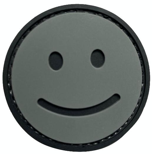 Smiley Face Morale Patch SMILE-2DGR front view – 1.77″ round grey smiley 3D PVC patch