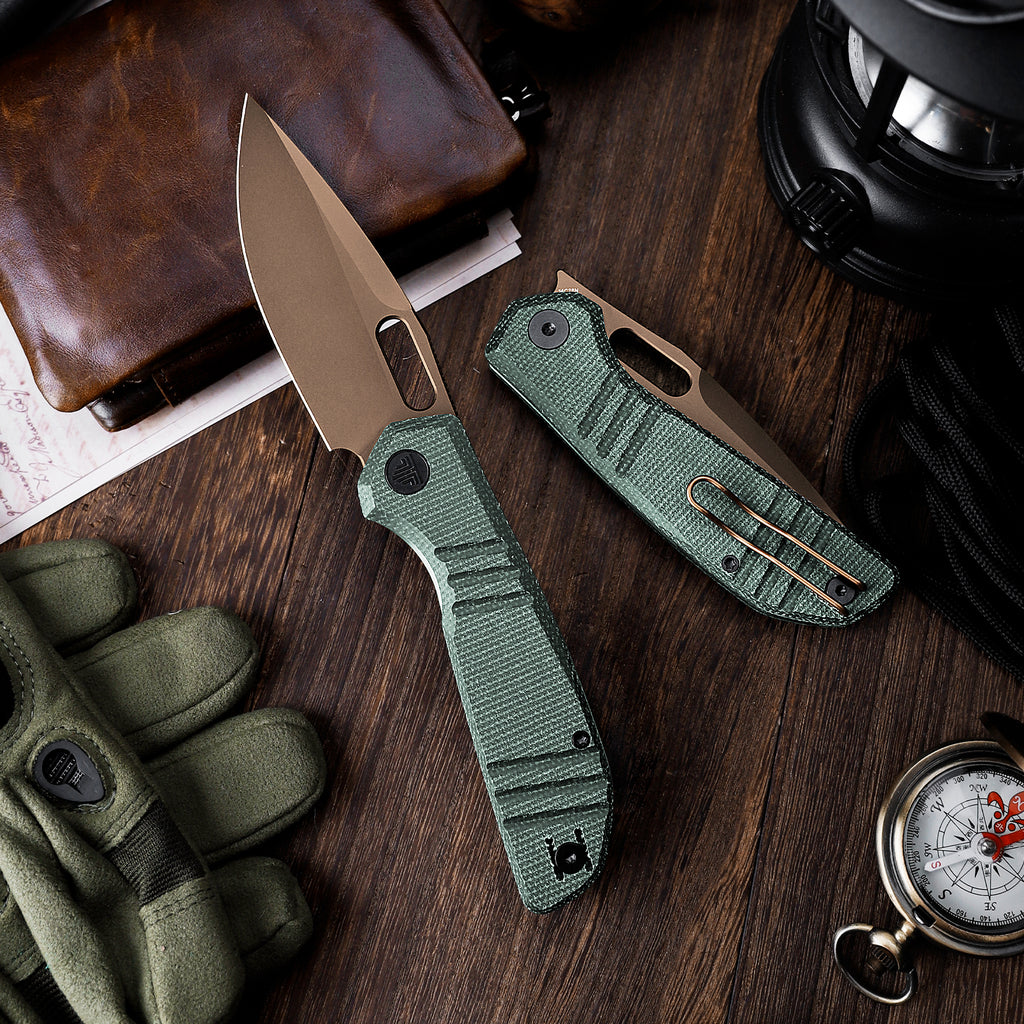 TRIVISA Gecko-GM JM04-GM-14 3.4 inch drop point liner lock knife with Micarta handle on wooden surface