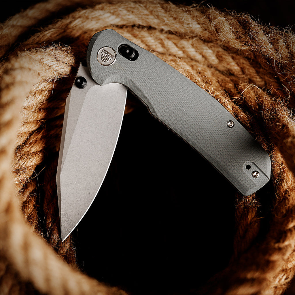 TRIVISA Hornet-03G JM01-GG-14 folding knife with gray G10 handle and drop point blade