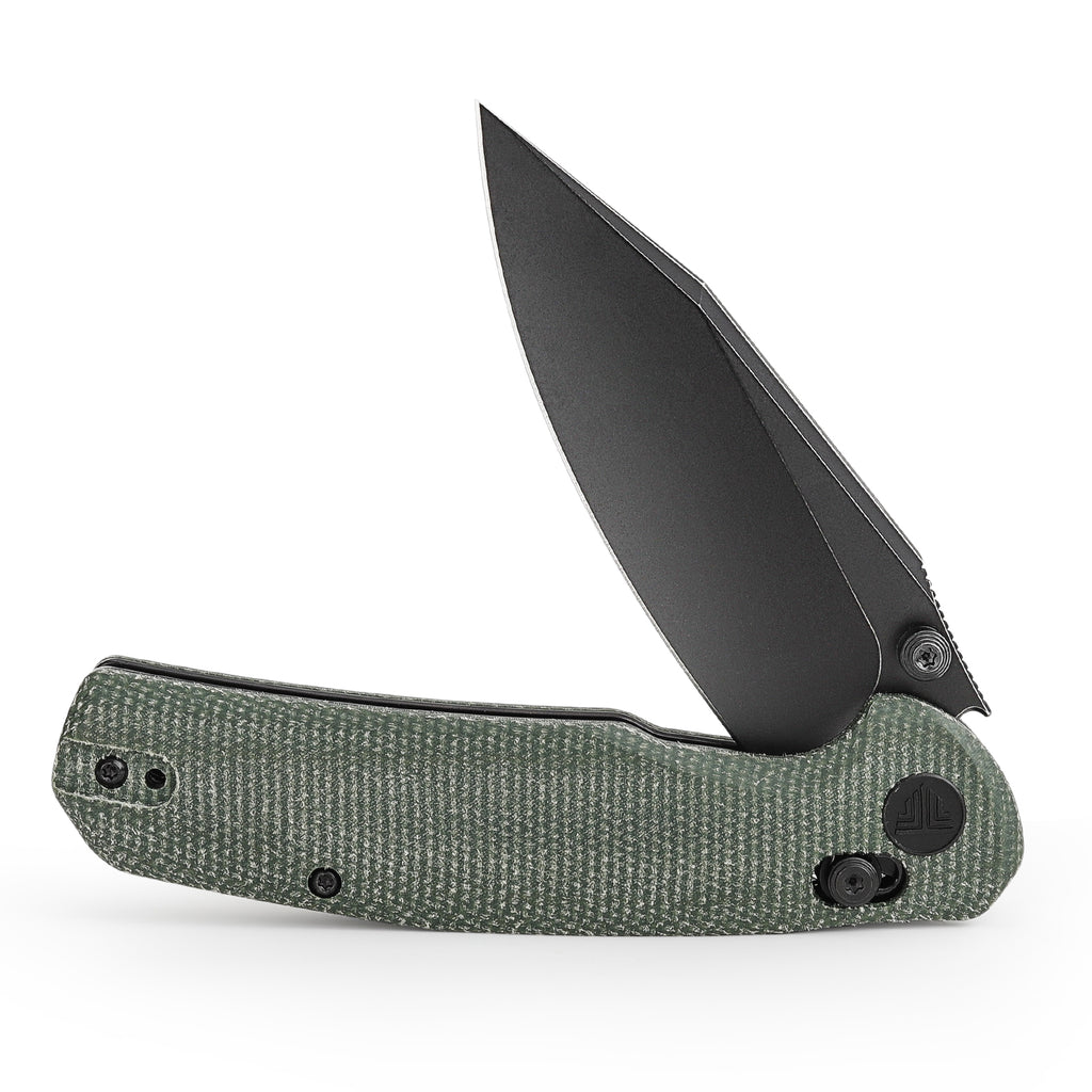 Folding knife with green textured handle, black blade, and ergonomic design