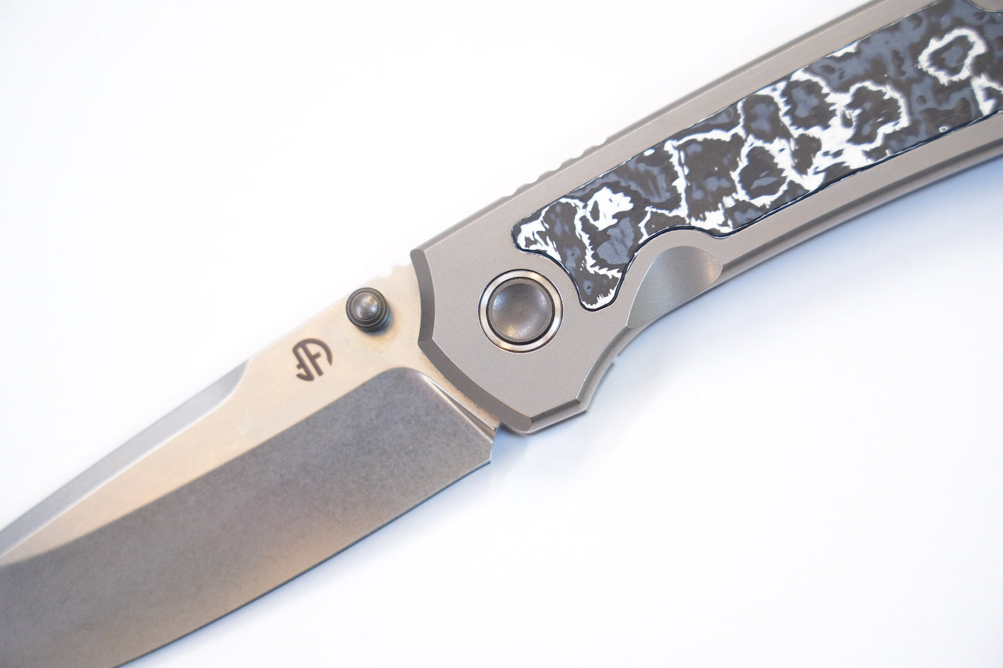 North Mountain Blade Ultra UltraM390-Titainum blade detail – hollow-ground M390 drop point