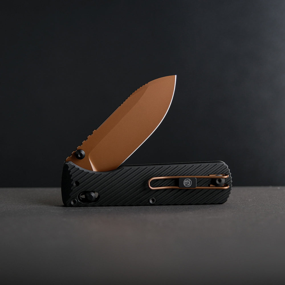 Vosteed Vombat Crossbar Lock Knife 2.92" M390 Copper Dune Blade Black Aluminum Handle A4107