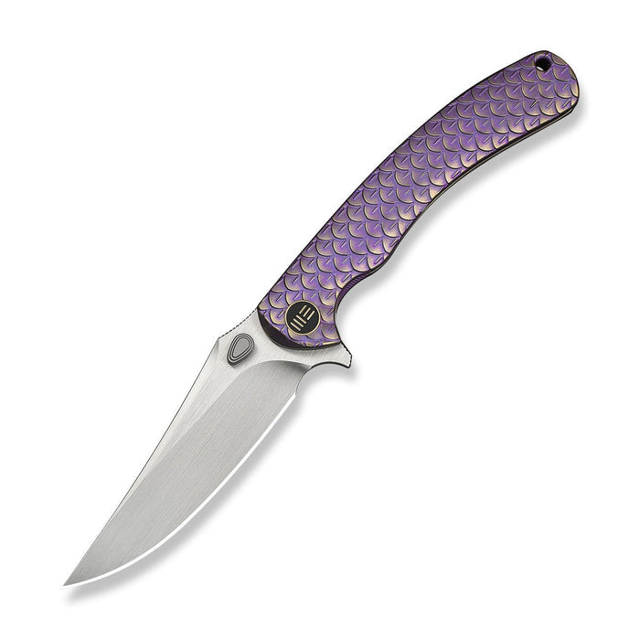 Closed WE Knife Dracarys WE25061B-2 with purple and gold titanium handle