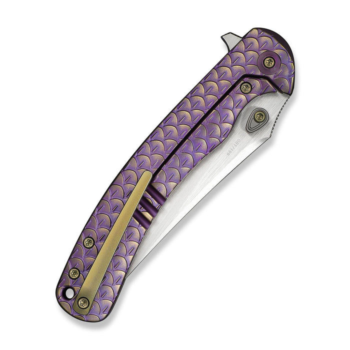 Closed WE Knife Dracarys WE25061B-2 with purple and gold titanium handle