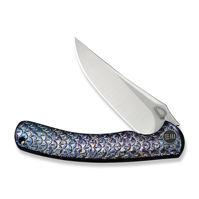 Closed WE Knife Dracarys WE25061B-3 with detailed flamed titanium handle