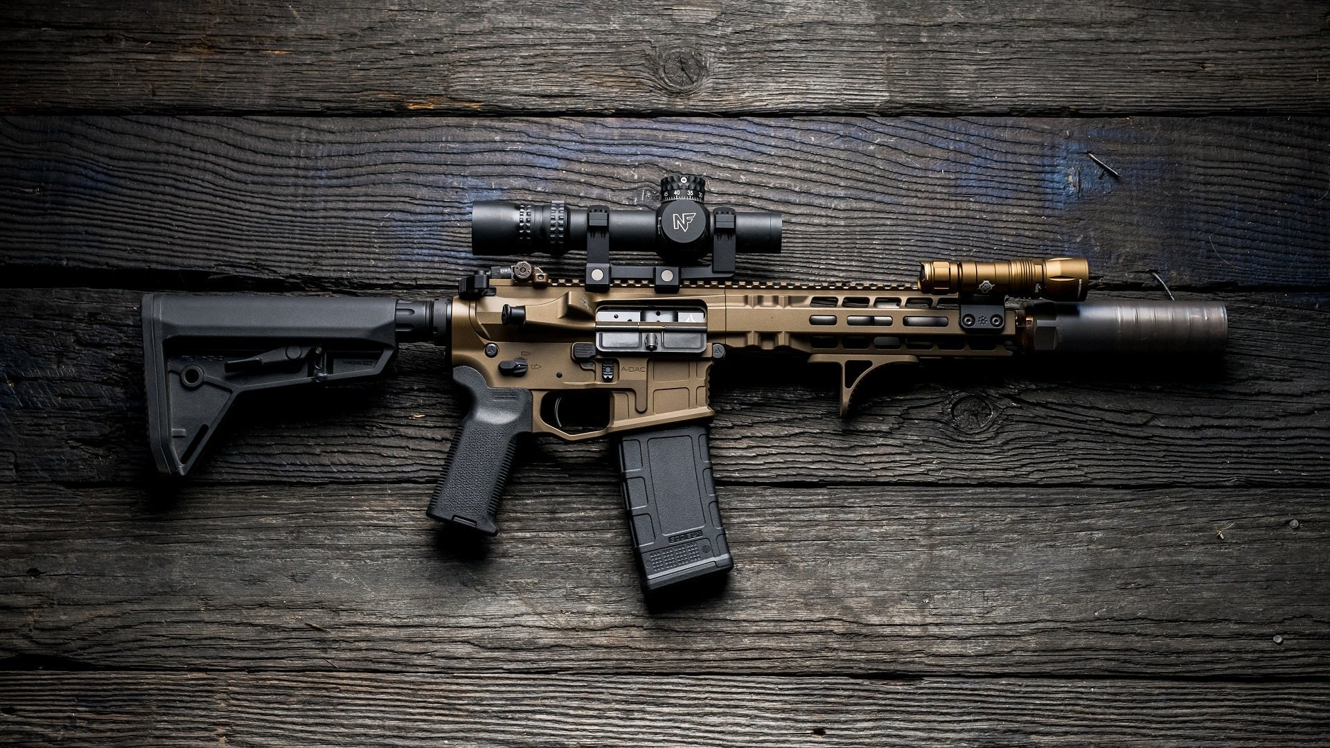 Weltool W35A FDE (WEL-W35A-FDE) rail-mounted weapon light installed on an AR rifle handguard